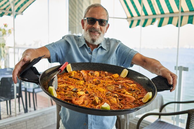 Albufera Private Day Tour: Paella, Boat Cruise and Nature Walk - Stop 5: El Palmar and the sunset boat cruise on the lake