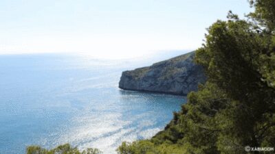 Exploring Costa Blanca's Hidden Beach Treasures - Granadella Beach: serene Javea cove water and cliff views