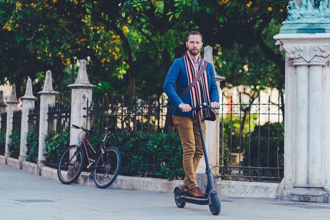 Grand City | Small Group Bike Tour through Top Highlights - Old Town squares: Plaza de la Virgen and Plaza de la Reina