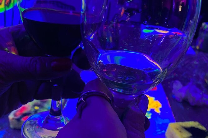Paint a neon fluorescent picture while drinking unlimited wine - Where The Art Wine House starts in Valencia