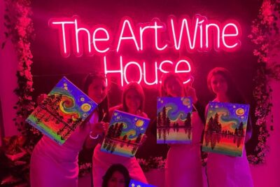 Paint a neon fluorescent picture while drinking unlimited wine - Two hours of neon painting with a pro guide