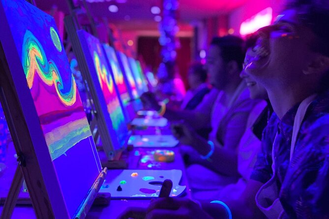 Paint a neon fluorescent picture while drinking unlimited wine - What it feels like with other people (and how English support helps)
