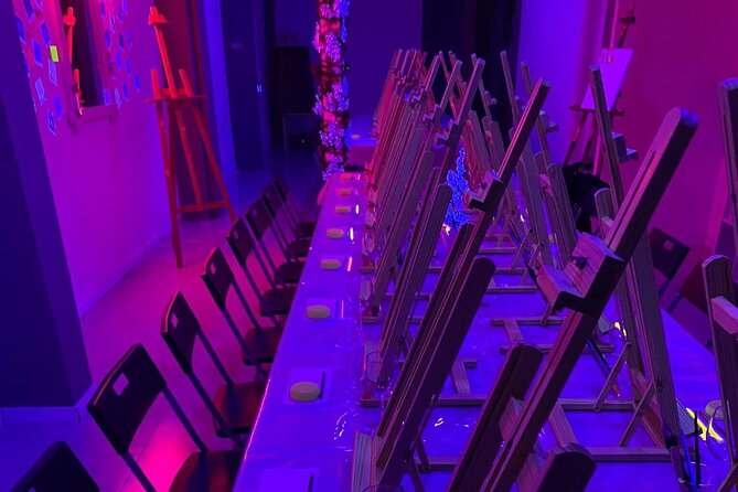 Paint a neon fluorescent picture while drinking unlimited wine - Who should book this neon wine painting class?