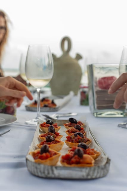 Valencia: Boat Ride with Valencian Wine Tasting & Tapas - Getting to the pier: El Palmar meeting point and how it feels