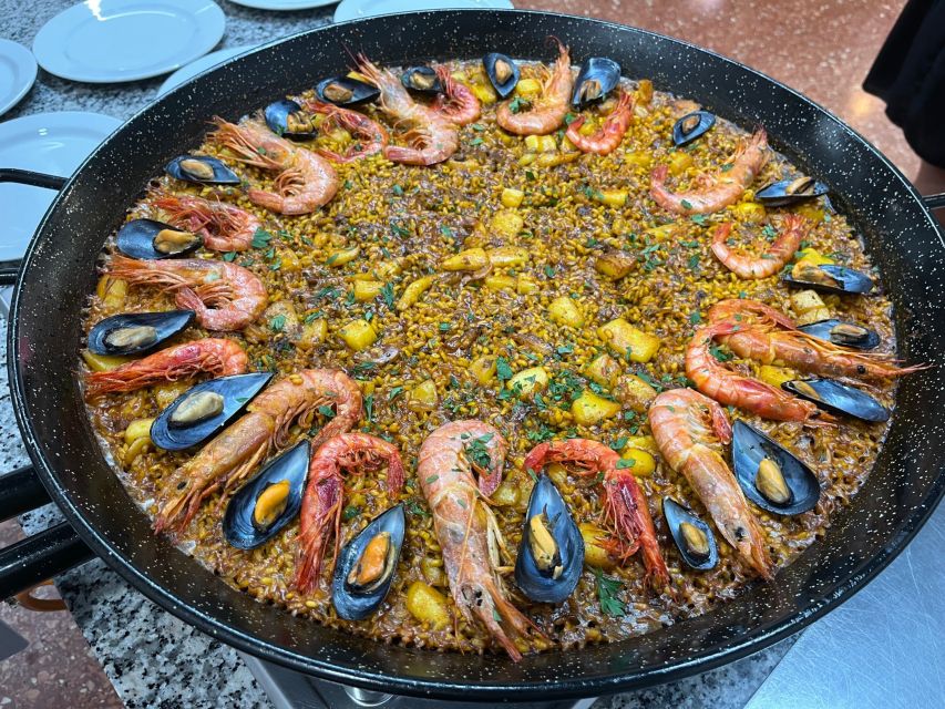 Valencia: Evening Guided Paella Workshop, Tapas, and Drinks - Dessert Finale: Coca de llanda, Fruit, Coffee, and Mistela