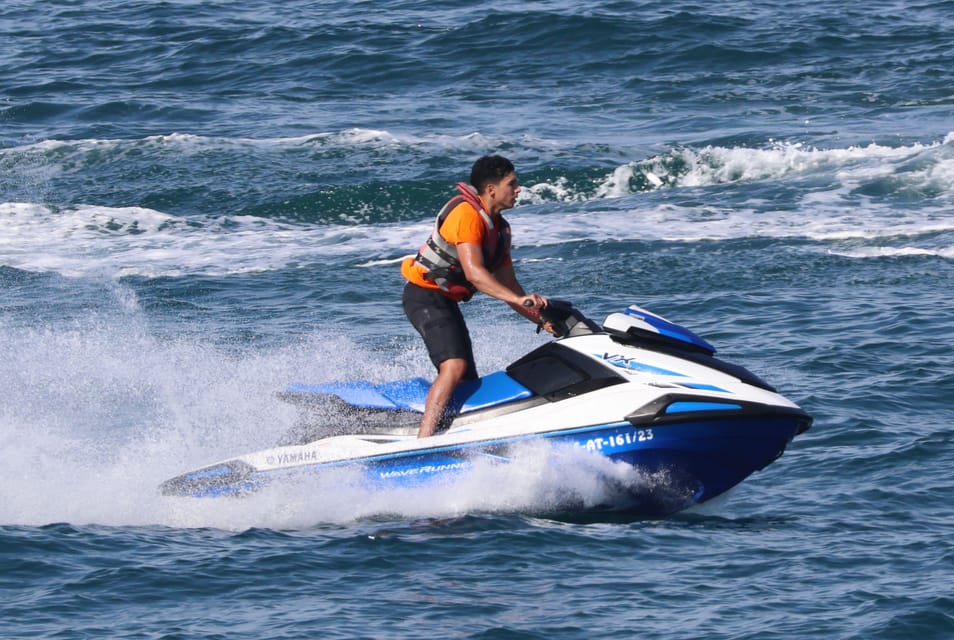 Valencia: Excursión en Moto de Agua + Paddle Surf - Meeting up on time: Carrer Marina Real Juan Carlos I, 25a