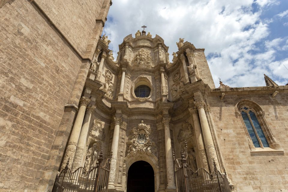 Valencia: Historic Center Audio-Guided Tour with Earphones - Plaza de la Virgen to the Town Hall area: Neptune and people-watching