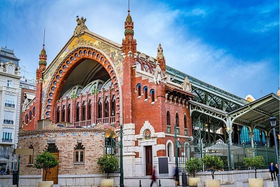 Valencia: Must-See Attractions Walking Tour - Virgen de los Desamparados Basilica and Correus: religion, civic life, and strong visuals