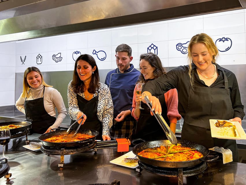 Valencia: Paella Cooking Class with Central Market Tour - Tapas, Wine, and Dessert: The Meal Part Is Built In