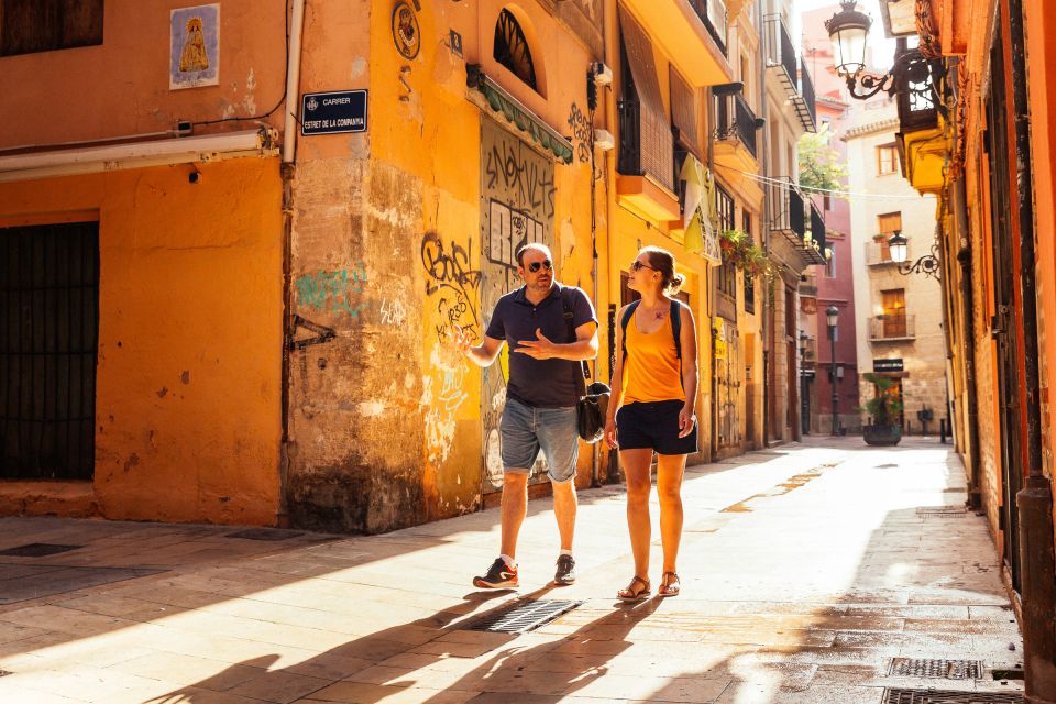 Valencia: Private Tour w/ Locals – Highlights & Hidden Gems - City Walls and Turia Gardens: How Valencia Reinvented Space