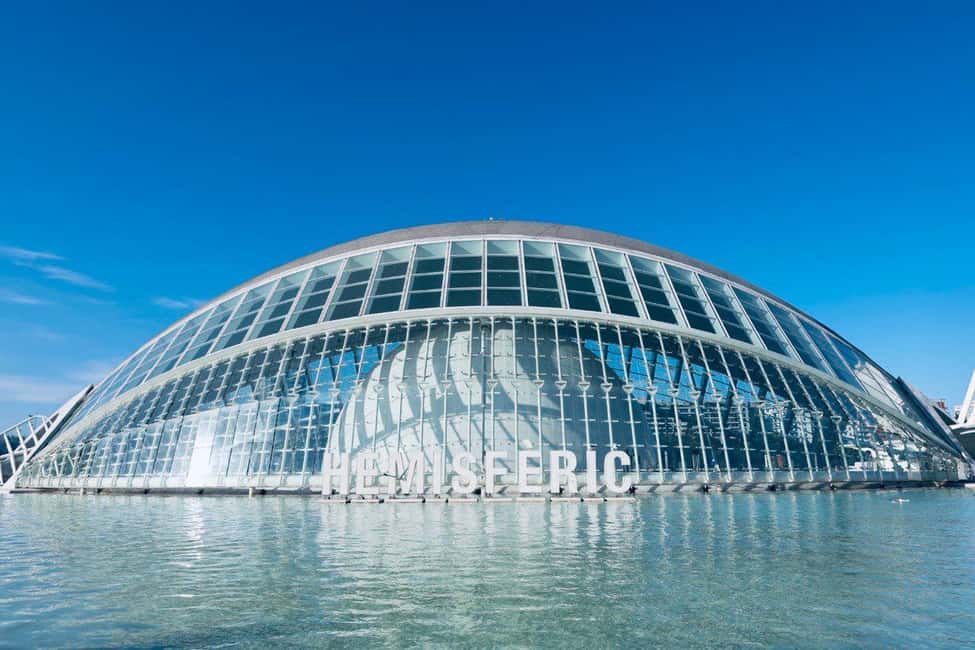 Valencia: the best 25 spots in the city by bike! - Plaza del Ayuntamiento and Palacio del Marques de Dos Aguas: the city’s official face and its oddball drama