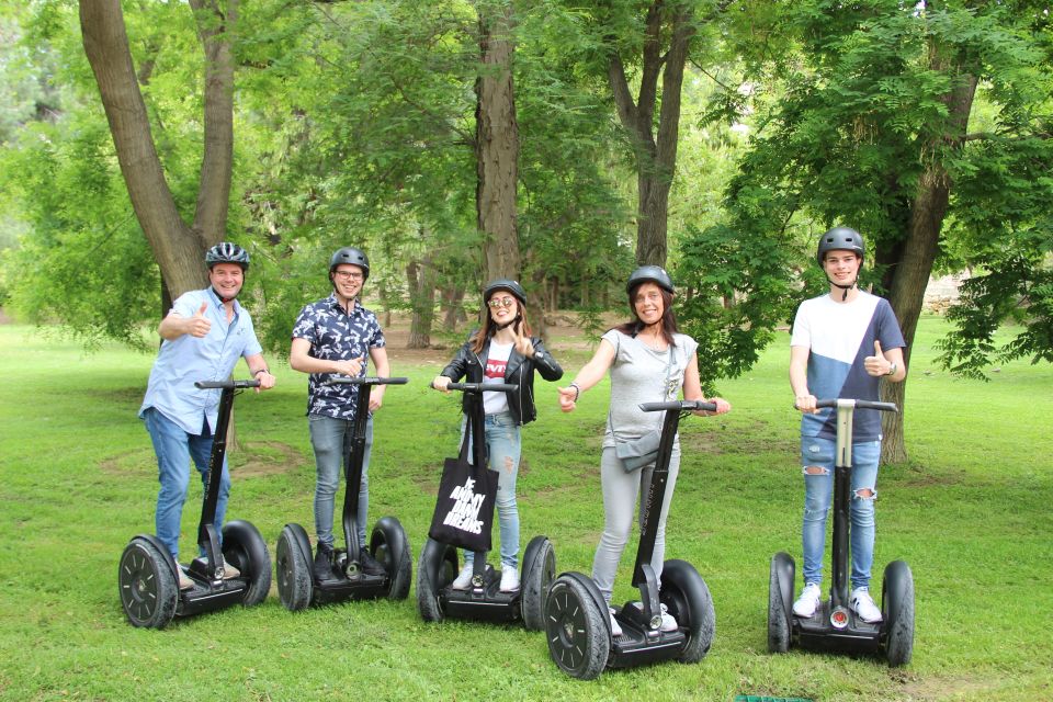 Valencia: Turia Park Segway Tour - Royal Gardens: rose garden scenery, sculptures, global trees, and parrots