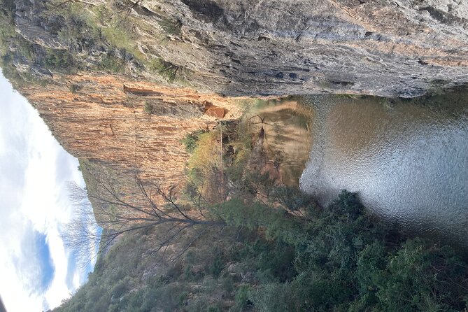 Walking Tour of the Hanging Bridges of Canyon de Turia and Chulilla Village - Olive groves, a 4WD track, and that turquoise reservoir contrast